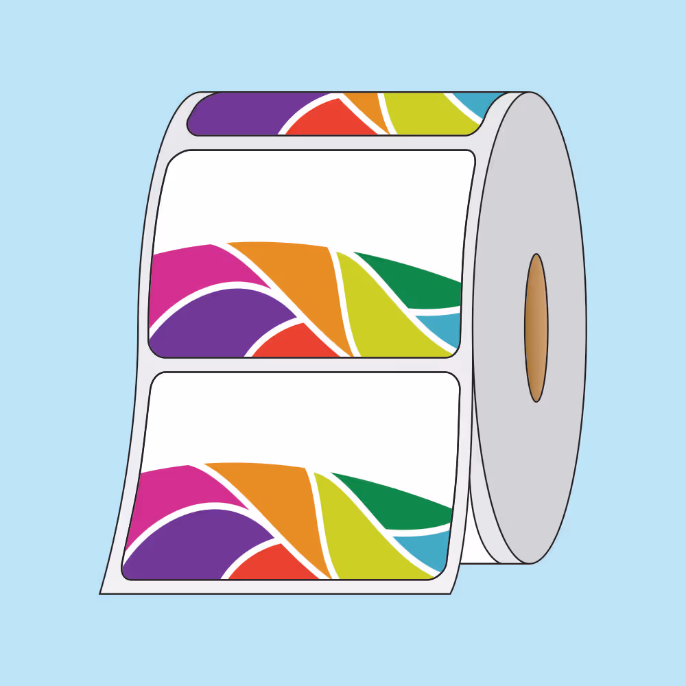 Roll of adhesive labels with multicolored abstract leaf-like patterns on a light blue background.