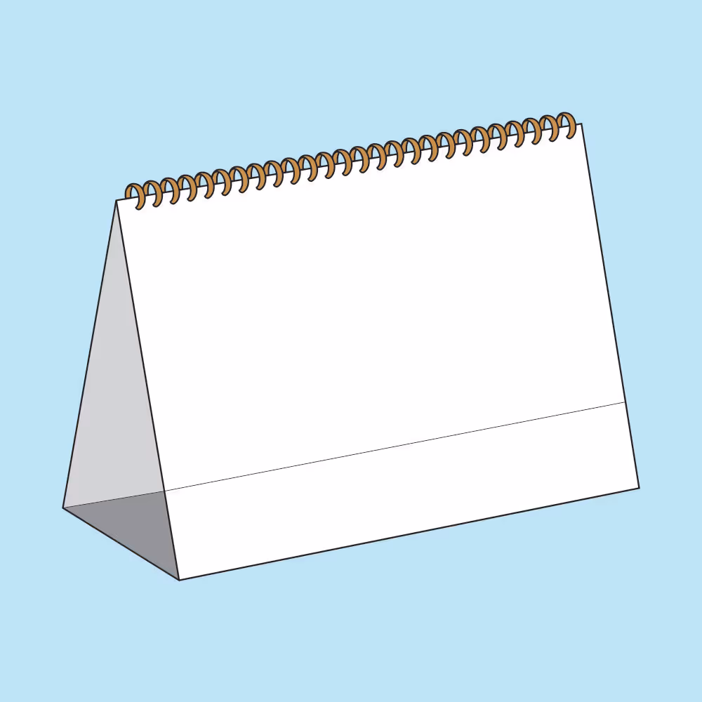 Blank white desk calendar with a triangular base and spiral binding on a light blue background.