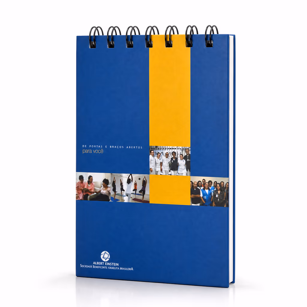 Bloco de mesa com espiral em azul e amarelo, personalizado com a marca do Hospital Albert Einstein